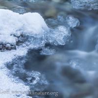 Ice and Flowing Water