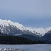 Crescent Bay and Snow-covered Mountains